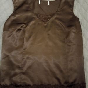 Polyester blouse but looks and feels like satin.
